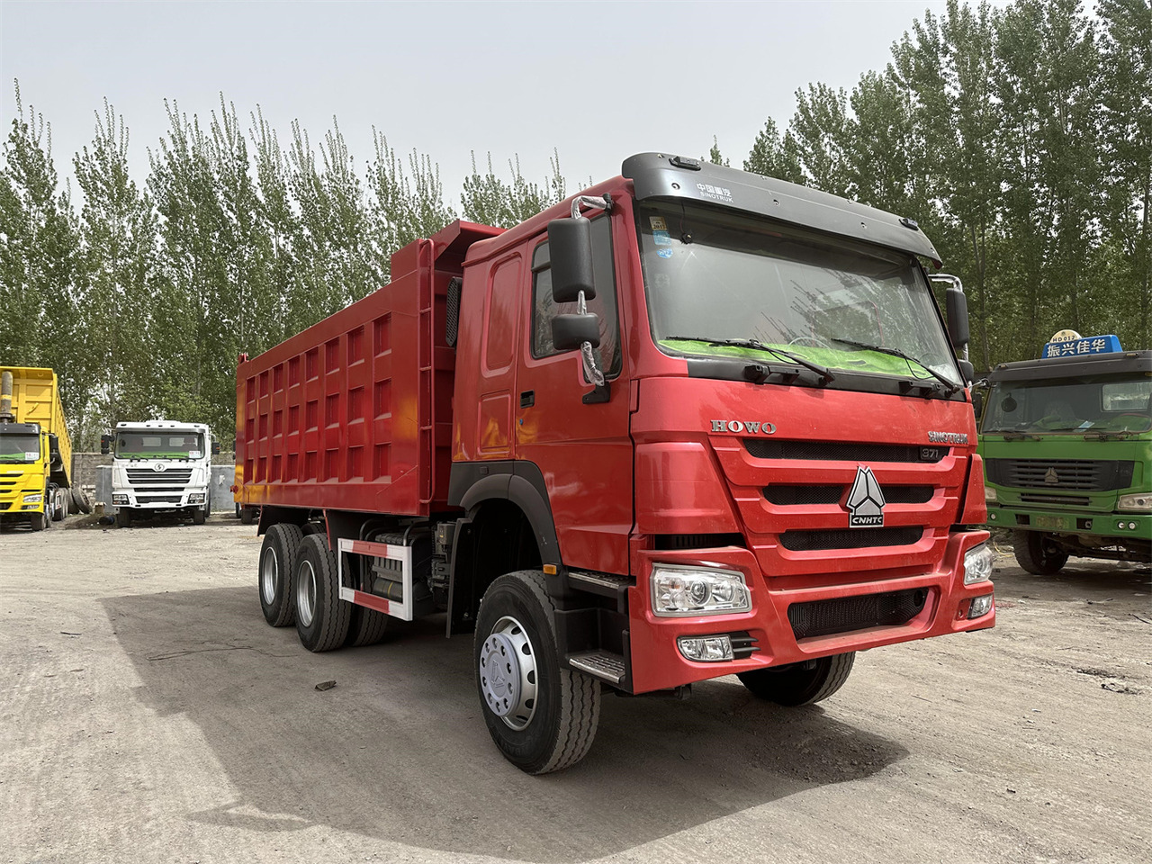Kamion vetëshkarkues për transportimin e siloseve SINOTRUK Howo Dump truck 371: foto 3