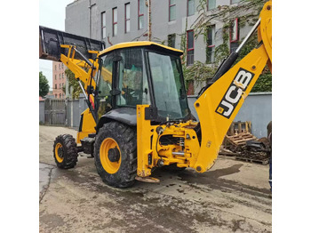 Fadromë me shkarkim nga prapa JCB 3CX: foto 5 Fadromë me shkarkim nga prapa JCB 3CX: foto 5