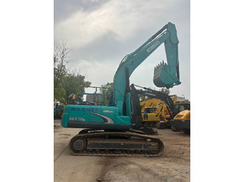 Ekskavator me zinxhirë Kobelco SK 210: foto 3 Ekskavator me zinxhirë Kobelco SK 210: foto 3