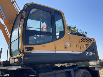 Ekskavator me goma HYUNDAI 210W-9: foto 4