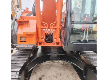 Ekskavator me zinxhirë Hitachi 135US: foto 5 Ekskavator me zinxhirë Hitachi 135US: foto 5