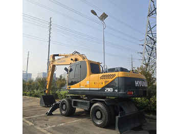 Ekskavator me goma HYUNDAI R210