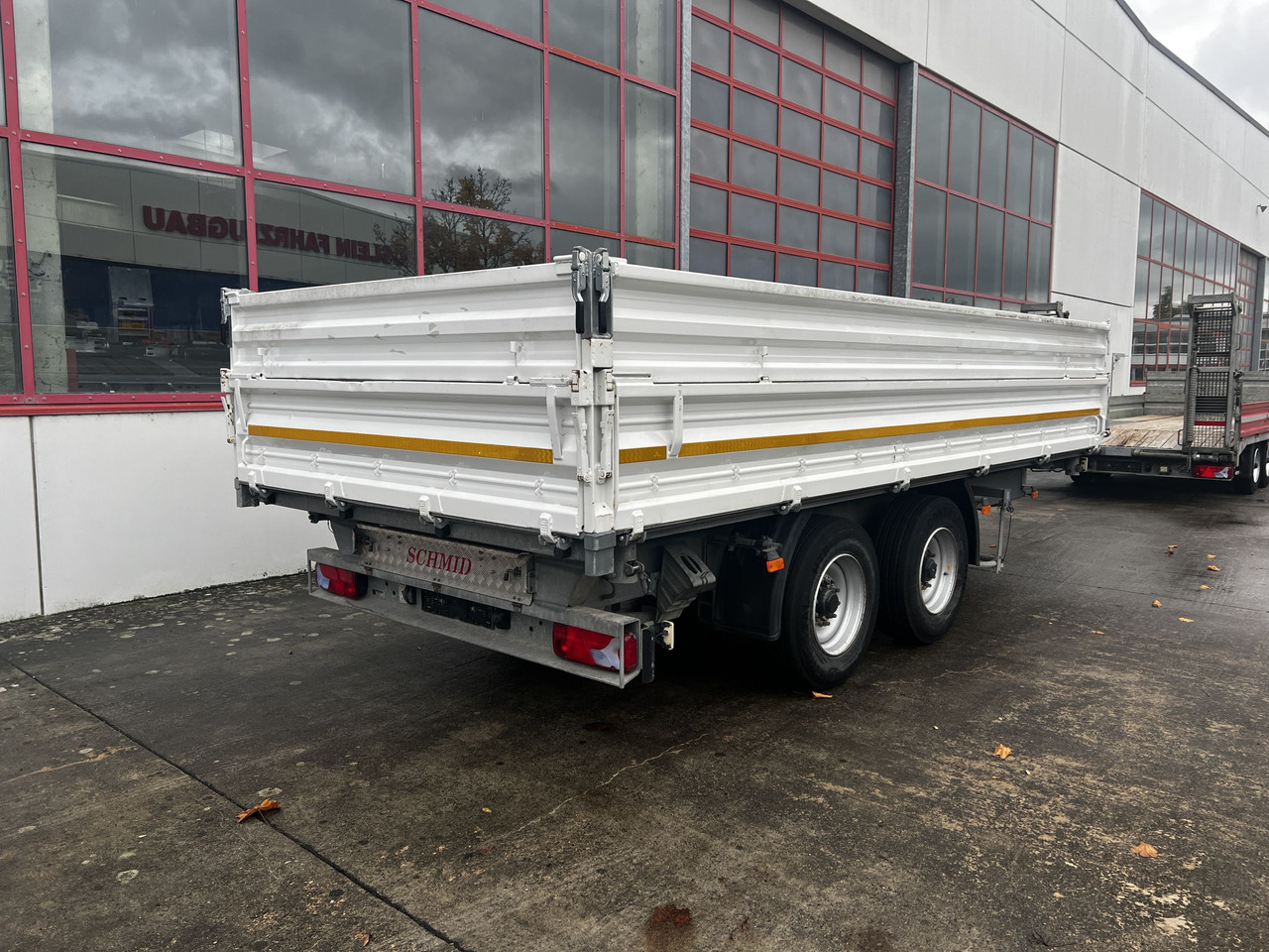 Schmid Fahrzeugbau DK 135 AR 13,5 t Tandemkipper mit Aufsatzbordwänden - Rimorkio vetëshkarkuese: foto 4 Schmid Fahrzeugbau DK 135 AR 13,5 t Tandemkipper mit Aufsatzbordwänden - Rimorkio vetëshkarkuese: foto 4