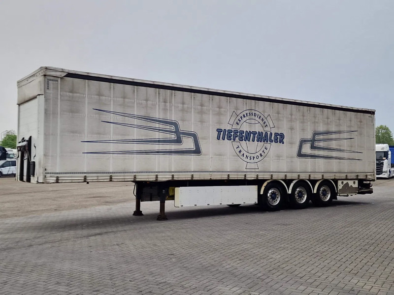 Schwarzmüller Tautliner 3 axle - Loadlift - Lift axle - BPW Axle - Lift axle - Alloy wheels - Gjysmë rimorkio me tendë: foto 3 Schwarzmüller Tautliner 3 axle - Loadlift - Lift axle - BPW Axle - Lift axle - Alloy wheels - Gjysmë rimorkio me tendë: foto 3