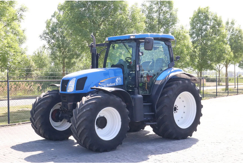 New Holland TS135A | 40 KM/H | 4X4 | SUPERSTEER - Traktor: foto 2 New Holland TS135A | 40 KM/H | 4X4 | SUPERSTEER - Traktor: foto 2