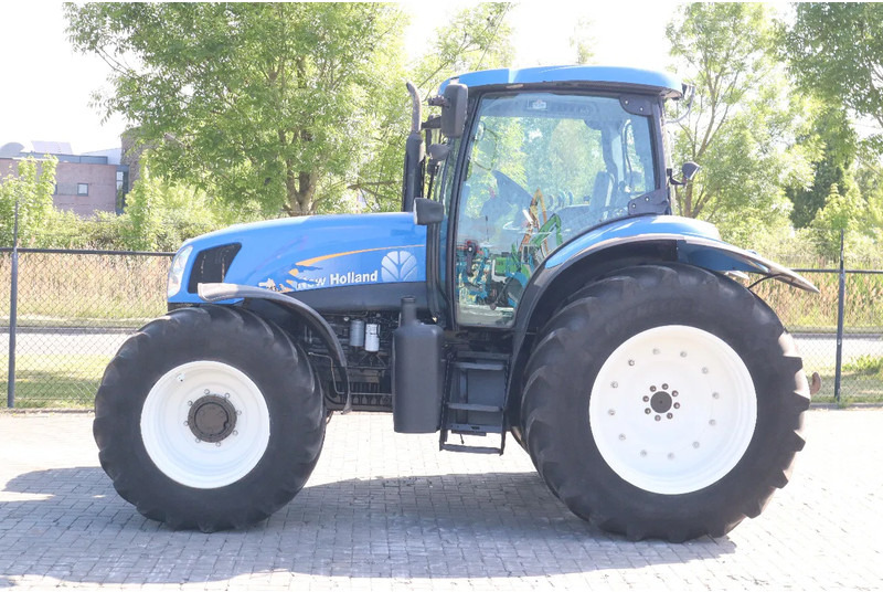 New Holland TS135A | 40 KM/H | 4X4 | SUPERSTEER - Traktor: foto 1 New Holland TS135A | 40 KM/H | 4X4 | SUPERSTEER - Traktor: foto 1