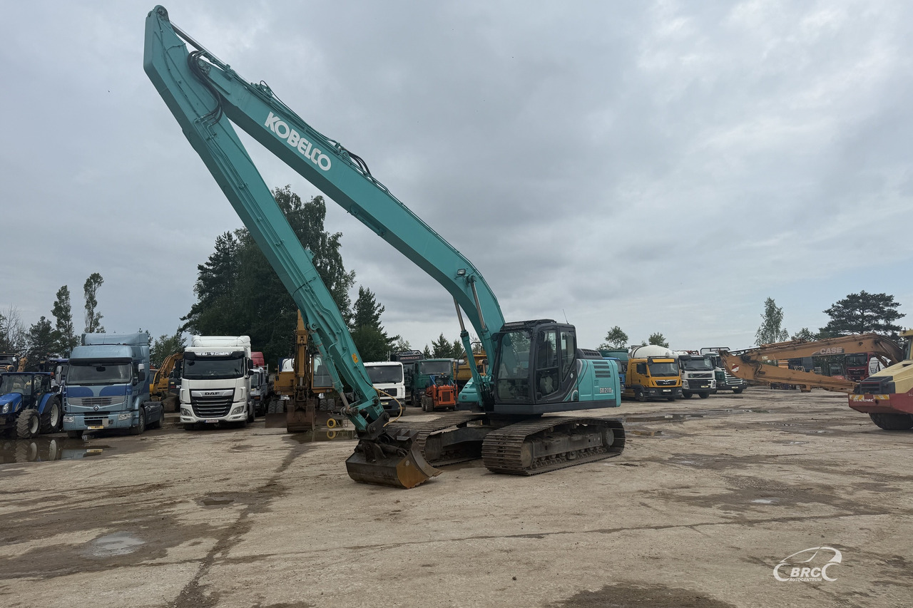 Kobelco SK210LC-10 - Ekskavator me zinxhirë: foto 1 Kobelco SK210LC-10 - Ekskavator me zinxhirë: foto 1