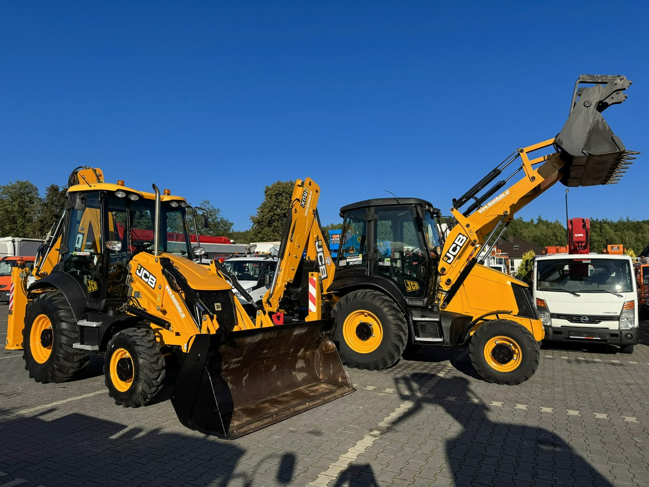 JCB 3CX - Fadromë me shkarkim nga prapa: foto 1 JCB 3CX - Fadromë me shkarkim nga prapa: foto 1