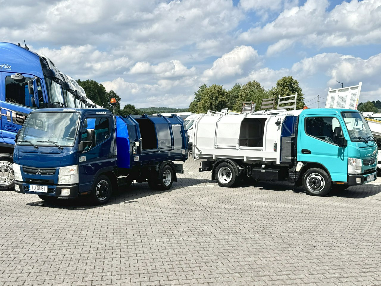 Mitsubishi Canter - Kamion mbeturinash: foto 1 Mitsubishi Canter - Kamion mbeturinash: foto 1