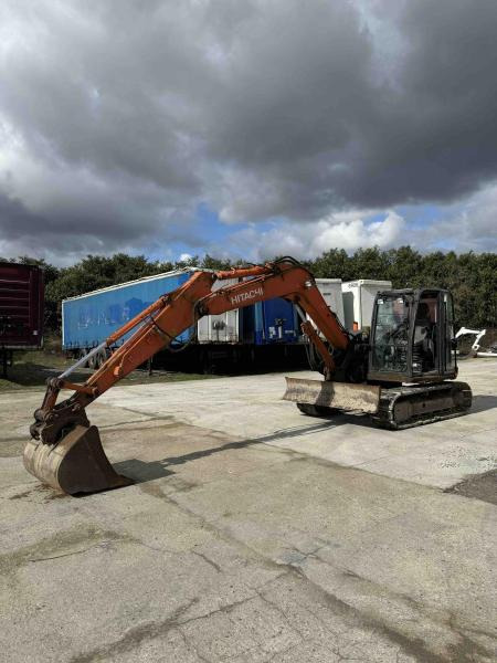 Hitachi ZX85USB-5A - Ekskavator me zinxhirë: foto 1 Hitachi ZX85USB-5A - Ekskavator me zinxhirë: foto 1