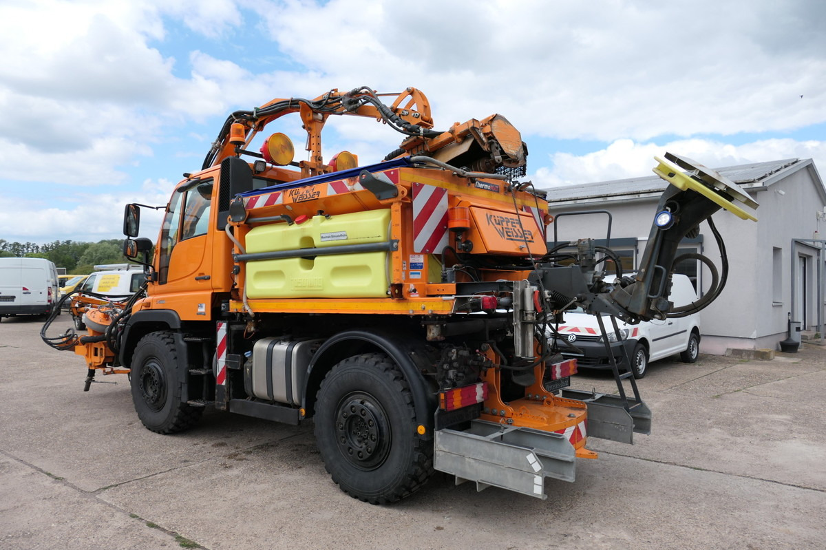 Kamion vetëshkarkues UNIMOG U400 405/12: foto 6