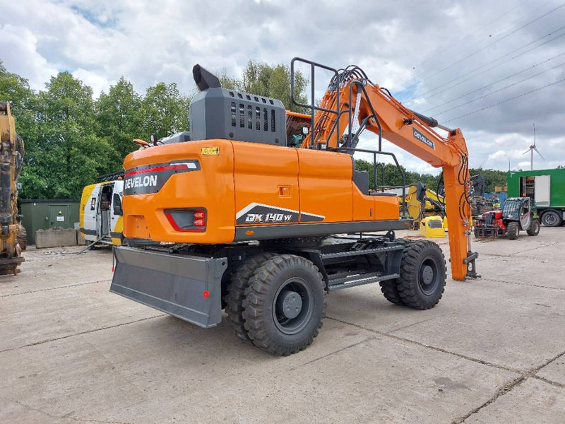 Develon DX 140 W-7 - Ekskavator me goma: foto 4 Develon DX 140 W-7 - Ekskavator me goma: foto 4