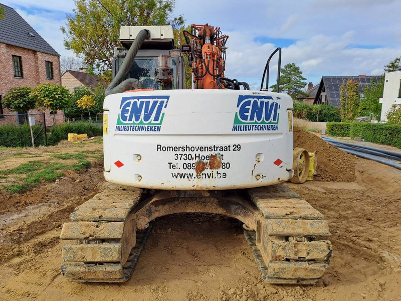 Hitachi ZX135US - Ekskavator me zinxhirë: foto 3 Hitachi ZX135US - Ekskavator me zinxhirë: foto 3