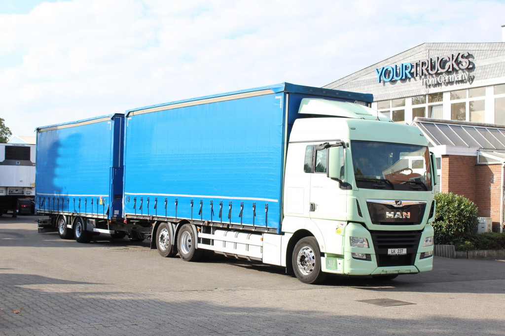 MAN TGX 26.460 Retarder Plane-Zug 120M3 Durchlade - Kamion me tendë: foto 1 MAN TGX 26.460 Retarder Plane-Zug 120M3 Durchlade - Kamion me tendë: foto 1