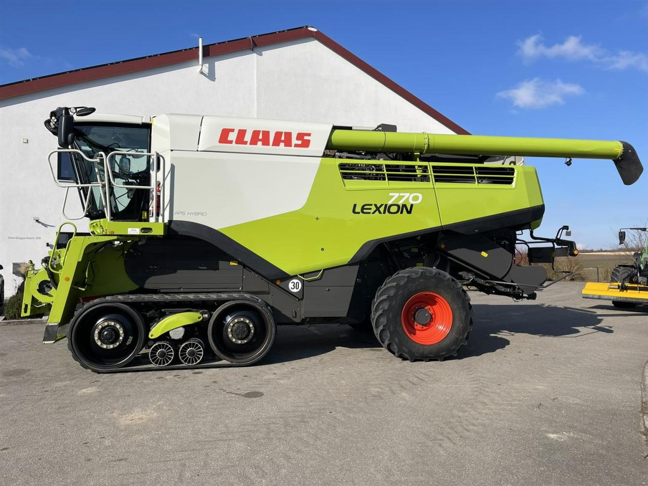 CLAAS Lexion 770TT Modell C76 mit CEMOS AUTOMATIC und Schneidwerk V1230 - Autokombajnë: foto 2 CLAAS Lexion 770TT Modell C76 mit CEMOS AUTOMATIC und Schneidwerk V1230 - Autokombajnë: foto 2