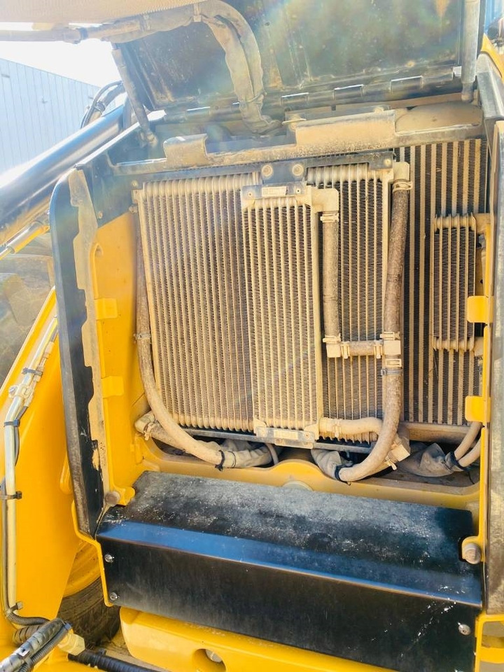 Fadromë me shkarkim nga prapa CAT 444 4x4: foto 13