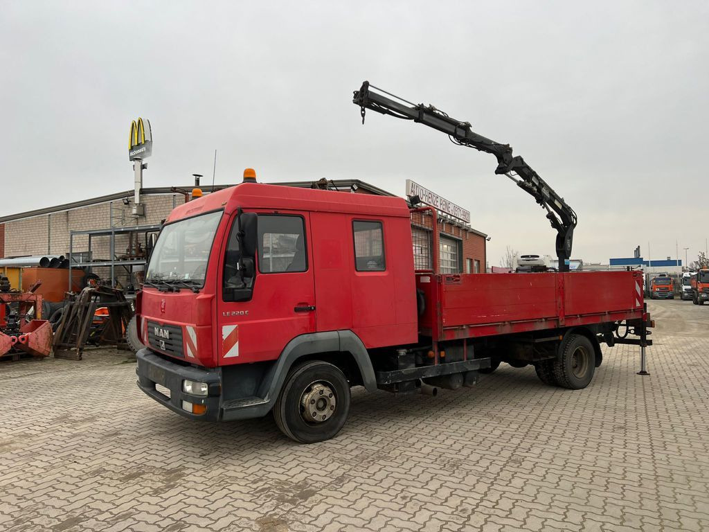 MAN LE 12.225 LC Pritsche Heckkran 6 Zylinder Doka T - Kamion me vinç, Kamion me karroceri të hapur: foto 1 MAN LE 12.225 LC Pritsche Heckkran 6 Zylinder Doka T - Kamion me vinç, Kamion me karroceri të hapur: foto 1