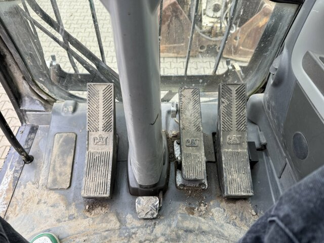 CAT M318D Mobilbagger *9.235 h *Schnellw. *Greifer - Ekskavator me goma: foto 2 CAT M318D Mobilbagger *9.235 h *Schnellw. *Greifer - Ekskavator me goma: foto 2