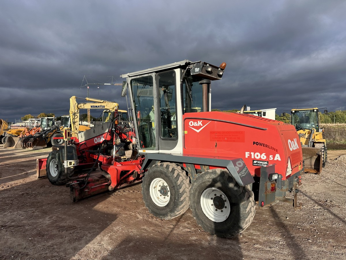 O&K F 106.5 - 6x6 Laser Topcon- Klima Cummins 6 Zyl. - Makinë niveluese: foto 5 O&K F 106.5 - 6x6 Laser Topcon- Klima Cummins 6 Zyl. - Makinë niveluese: foto 5