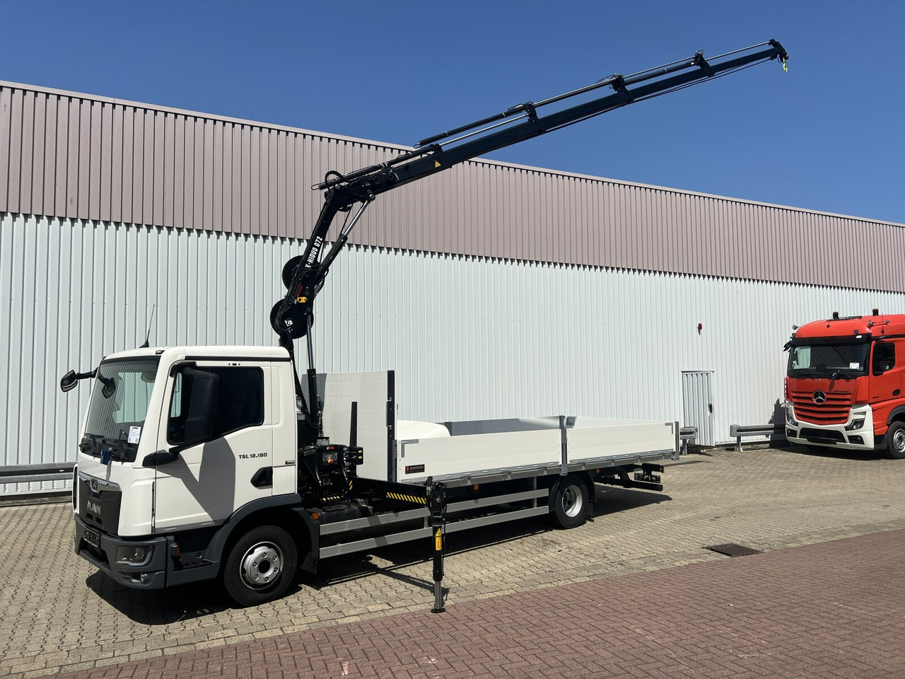 MAN TGL 12.190 4x2 BL TGL 12.190 4x2 BL mit Kran Hiab Hiduo 072DS-4 - Kamion me vinç: foto 1 MAN TGL 12.190 4x2 BL TGL 12.190 4x2 BL mit Kran Hiab Hiduo 072DS-4 - Kamion me vinç: foto 1
