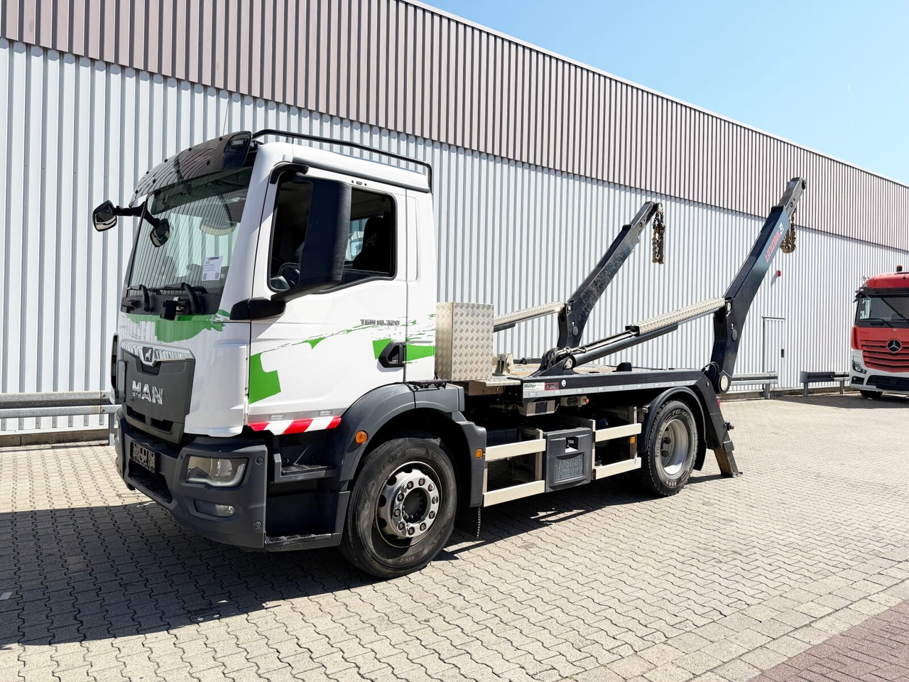 MAN TGM 18.320 4x2 BL TGM 18.320 4x2 BL, Hiab Tele-Absetzanlage, Funk - Fadromë ngarkuese: foto 1 MAN TGM 18.320 4x2 BL TGM 18.320 4x2 BL, Hiab Tele-Absetzanlage, Funk - Fadromë ngarkuese: foto 1