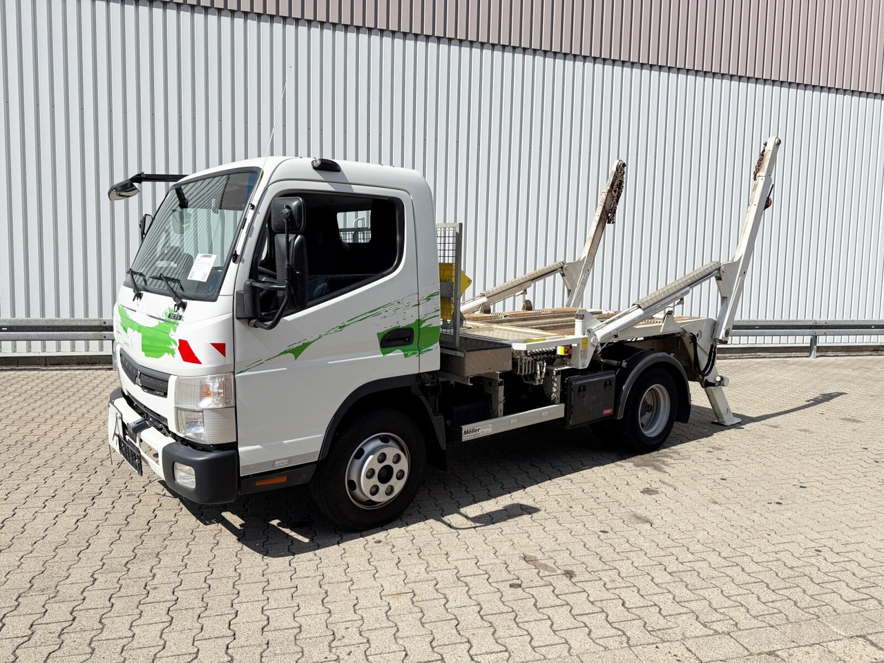 Mitsubishi Canter Fuso 7C15 4x2 Canter Fuso 7C15 4x2, Tele-Absetzer, Vereiterbar bis 10m³ - Fadromë ngarkuese: foto 1 Mitsubishi Canter Fuso 7C15 4x2 Canter Fuso 7C15 4x2, Tele-Absetzer, Vereiterbar bis 10m³ - Fadromë ngarkuese: foto 1