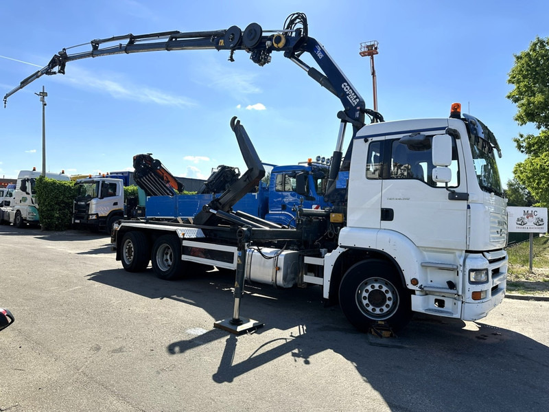 MAN TGA 26.310 6X2 HOOKLIFT + CRANE COPMA 160.4 + JIB J2 + WINCH - RADIO - LIFT + STEERING AXLE - EURO 3 - BE - Kamion vetëngarkues, Kamion me vinç: foto 1 MAN TGA 26.310 6X2 HOOKLIFT + CRANE COPMA 160.4 + JIB J2 + WINCH - RADIO - LIFT + STEERING AXLE - EURO 3 - BE - Kamion vetëngarkues, Kamion me vinç: foto 1