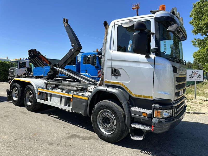 Scania G450 6x4 HOOKLIFT AJK 20T - 5760mm - 3m90 WB - HUB REDUCTION / STEEL SUSP. - EURO 6 - BE TRUCK - Kamion vetëngarkues: foto 1 Scania G450 6x4 HOOKLIFT AJK 20T - 5760mm - 3m90 WB - HUB REDUCTION / STEEL SUSP. - EURO 6 - BE TRUCK - Kamion vetëngarkues: foto 1