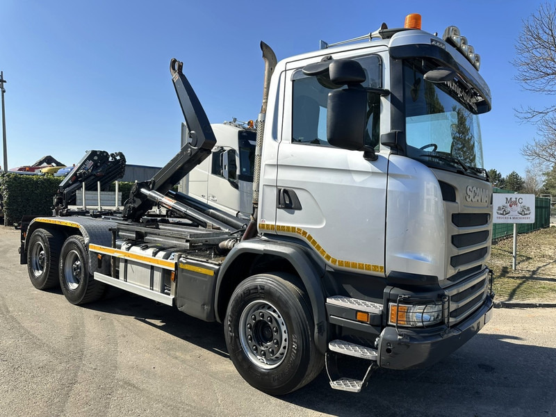 Scania G450 6x4 HOOKLIFT / HAAKSYSTEEM AJK 20T - 5760mm - 3m90 WB - HUB REDUCTION / STEEL SUSPENSION - EURO 6 - BE TRUCK - Kamion vetëngarkues: foto 1 Scania G450 6x4 HOOKLIFT / HAAKSYSTEEM AJK 20T - 5760mm - 3m90 WB - HUB REDUCTION / STEEL SUSPENSION - EURO 6 - BE TRUCK - Kamion vetëngarkues: foto 1