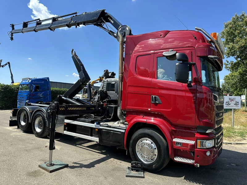 Scania R580 6X2 V8 HOOKLIFT + CRANE HIAB 211 E-4 HIPRO - ROTATOR - RETARDER - ALCOA ALU - RADIO - NL TRUCK - Kamion vetëngarkues, Kamion me vinç: foto 1 Scania R580 6X2 V8 HOOKLIFT + CRANE HIAB 211 E-4 HIPRO - ROTATOR - RETARDER - ALCOA ALU - RADIO - NL TRUCK - Kamion vetëngarkues, Kamion me vinç: foto 1