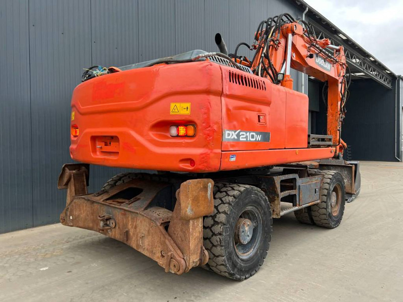 Doosan DX210W - Ekskavator me goma: foto 4 Doosan DX210W - Ekskavator me goma: foto 4