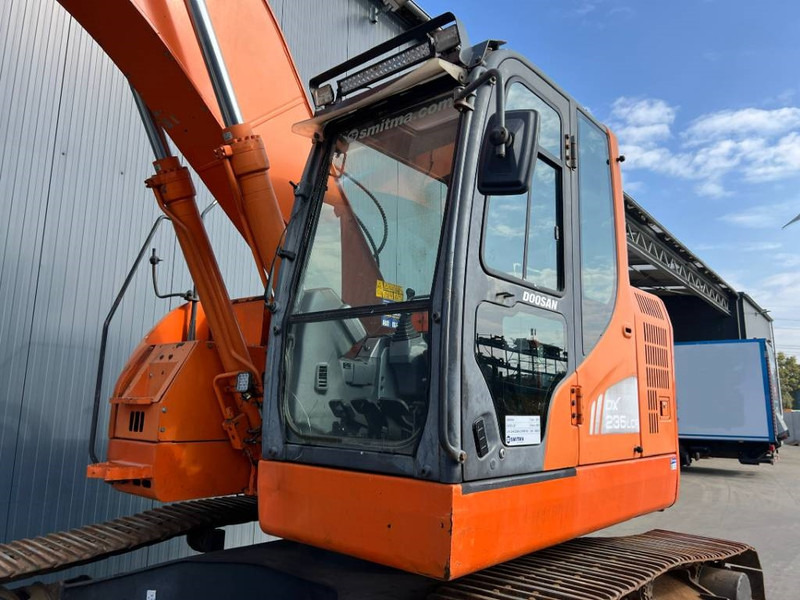Doosan DX235LCR - Ekskavator me zinxhirë: foto 5 Doosan DX235LCR - Ekskavator me zinxhirë: foto 5
