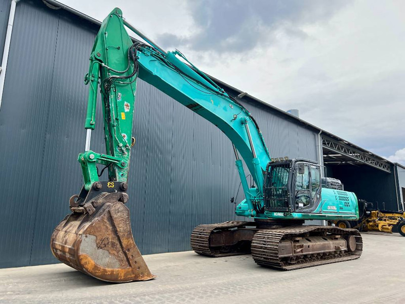 Kobelco SK500LC-9 - Ekskavator me zinxhirë: foto 1 Kobelco SK500LC-9 - Ekskavator me zinxhirë: foto 1