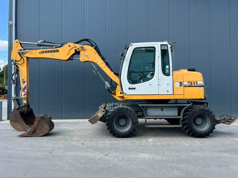 Liebherr A311 Litronic - Ekskavator me goma: foto 5 Liebherr A311 Litronic - Ekskavator me goma: foto 5
