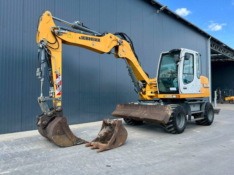 Liebherr A311 Litronic - Ekskavator me goma: foto 1 Liebherr A311 Litronic - Ekskavator me goma: foto 1