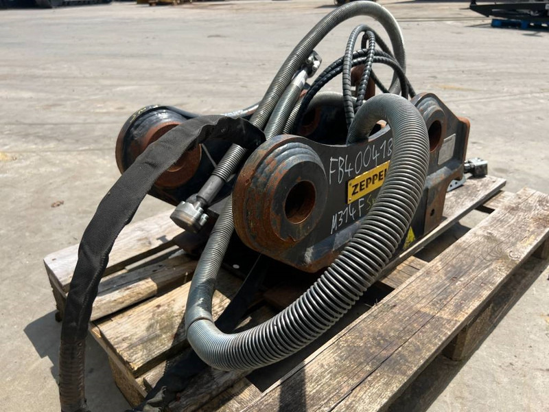 OilQuick OQ65 - M314F / M316F / M318F - Bashkues i shpejtë për Makineri ndërtimi: foto 5 OilQuick OQ65 - M314F / M316F / M318F - Bashkues i shpejtë për Makineri ndërtimi: foto 5