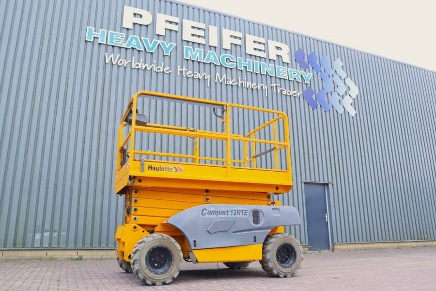 Haulotte Compact 12RTE Electric, 12m Working Height, 450kg - Ngritës gërshërë: foto 1 Haulotte Compact 12RTE Electric, 12m Working Height, 450kg - Ngritës gërshërë: foto 1