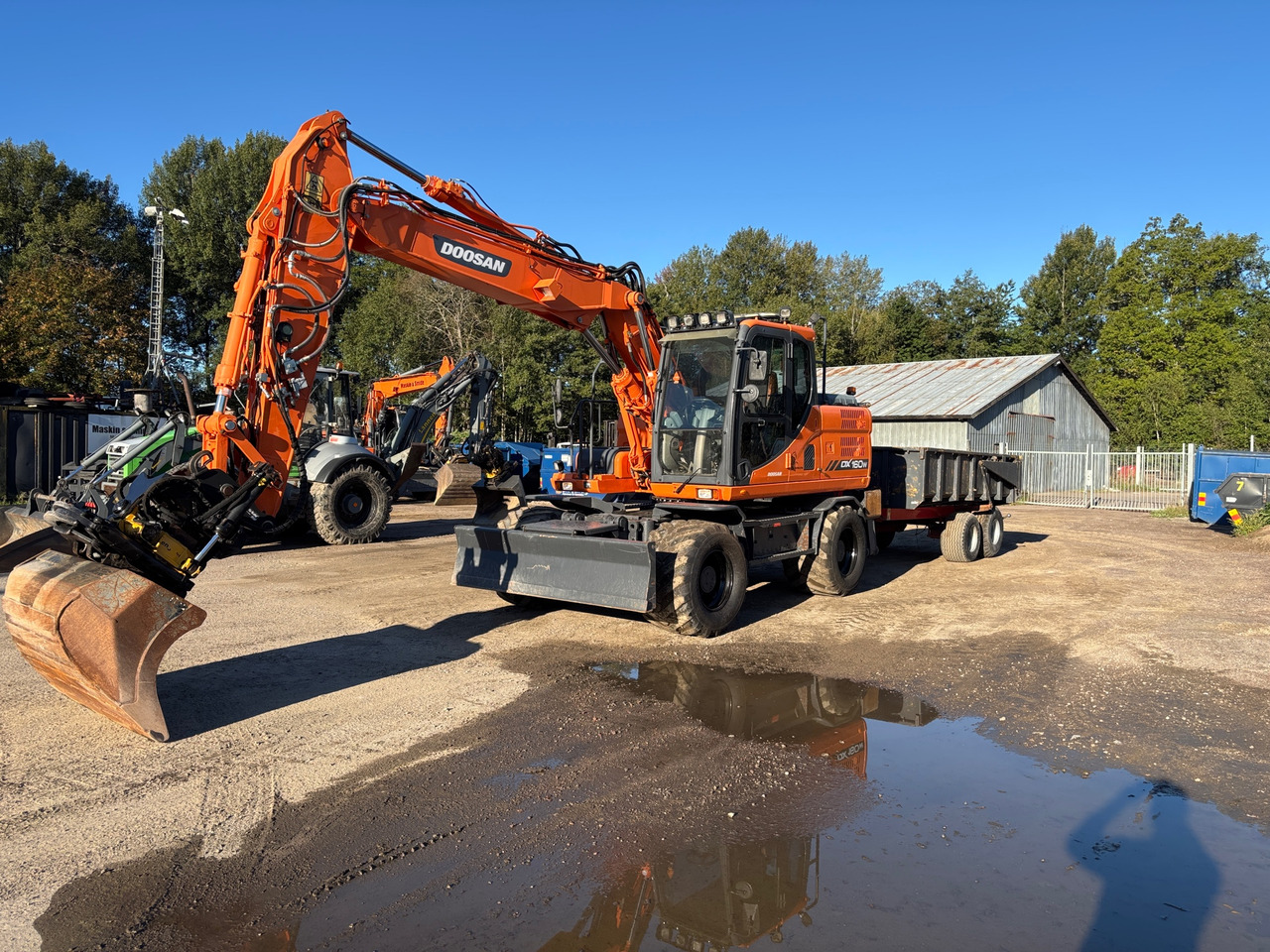 Doosan DX160W - Ekskavator: foto 1 Doosan DX160W - Ekskavator: foto 1