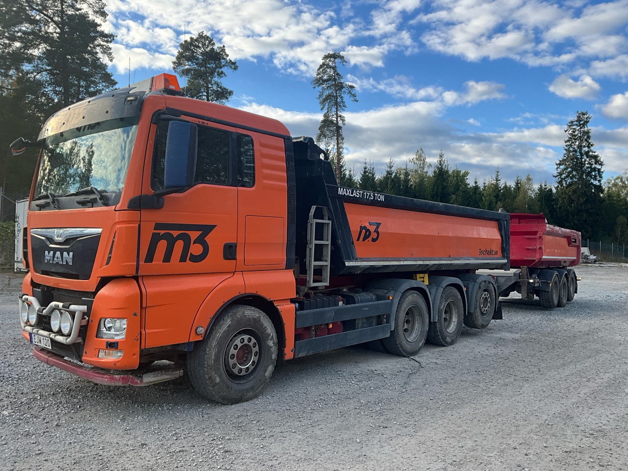 MAN TGX 35.480 8X4 - Kamion vetëshkarkues: foto 1 MAN TGX 35.480 8X4 - Kamion vetëshkarkues: foto 1