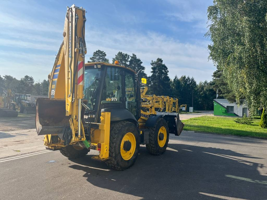 Komatsu WB 97 S-8 - Fadromë me shkarkim nga prapa: foto 3 Komatsu WB 97 S-8 - Fadromë me shkarkim nga prapa: foto 3