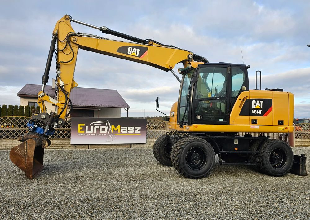 Caterpillar M314F, 2019 ROK, 5600 MTH, GŁOWICA SMP - Ekskavator me goma: foto 1 Caterpillar M314F, 2019 ROK, 5600 MTH, GŁOWICA SMP - Ekskavator me goma: foto 1