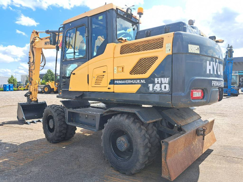 Hyundai HW 140 - Ekskavator me goma: foto 1 Hyundai HW 140 - Ekskavator me goma: foto 1