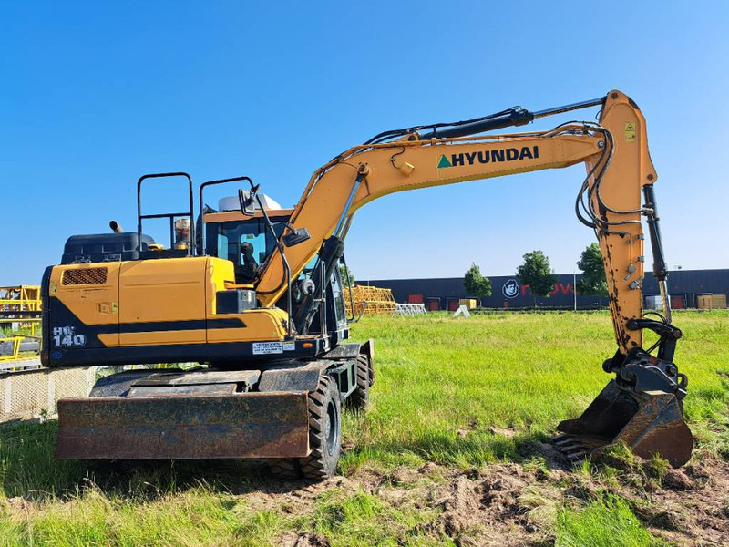 Hyundai HW140 - Ekskavator me goma: foto 4 Hyundai HW140 - Ekskavator me goma: foto 4