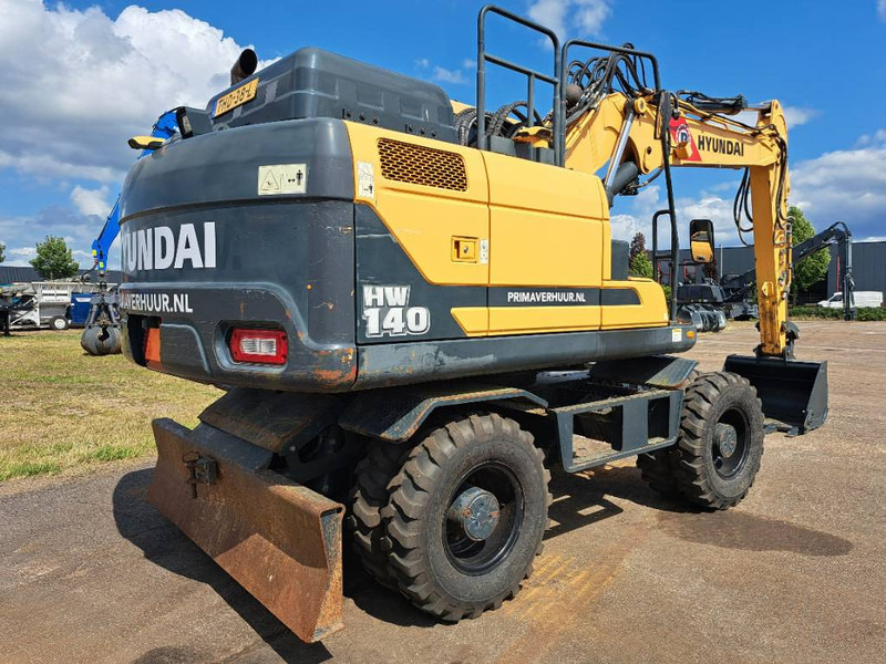 Hyundai HW140 - Ekskavator me goma: foto 3 Hyundai HW140 - Ekskavator me goma: foto 3