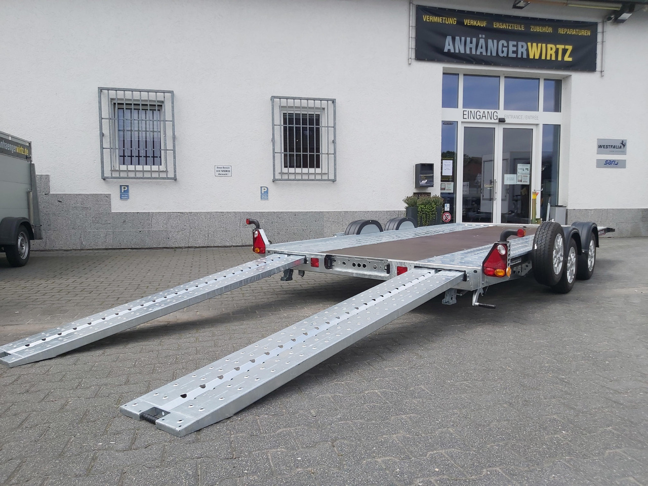 Rimorkio autotransportuese Brian James A4 Transporter 450x200cm black X Rampen 240cm Stützen Alufelgen silver 2600kg: foto 8 Rimorkio autotransportuese Brian James A4 Transporter 450x200cm black X Rampen 240cm Stützen Alufelgen silver 2600kg: foto 8