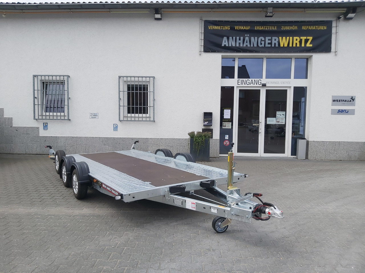 Rimorkio autotransportuese Brian James A4 Transporter 450x200cm black X Rampen 240cm Stützen Alufelgen silver 2600kg: foto 6 Rimorkio autotransportuese Brian James A4 Transporter 450x200cm black X Rampen 240cm Stützen Alufelgen silver 2600kg: foto 6