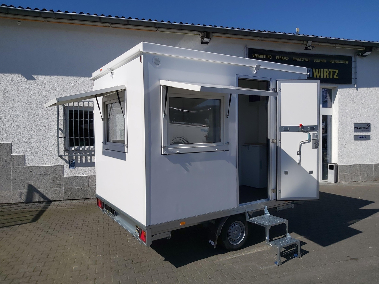 Rimorkio shpërndarëse Mobiles Büro 310x220x220cm Tür + 3 Fenster + WC Raum (M) 1200kg: foto 9