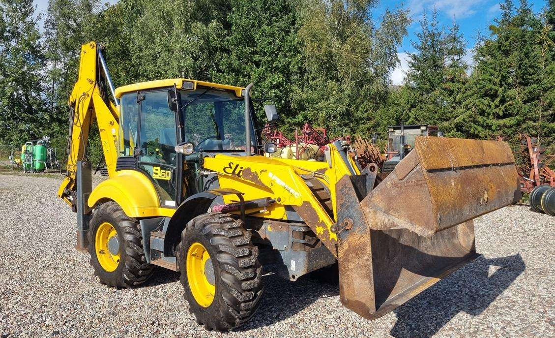 Fermec 960 Elite - Fadromë me shkarkim nga prapa: foto 2 Fermec 960 Elite - Fadromë me shkarkim nga prapa: foto 2