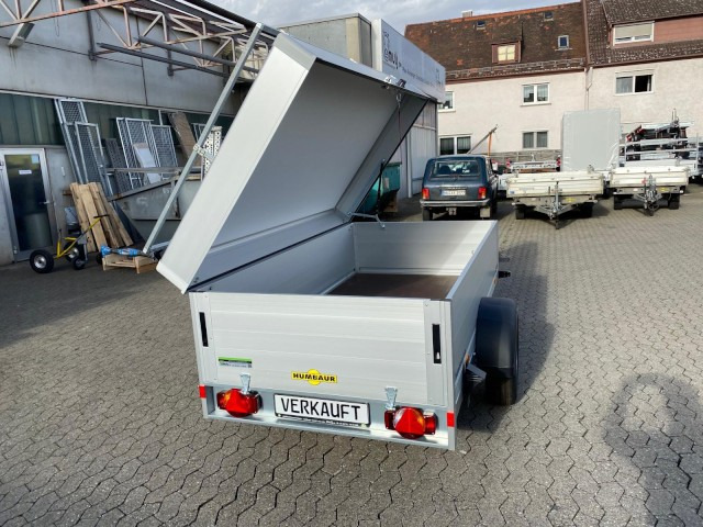 Humbaur HA 132513-5 mit Holz-Alu Deckel mit Reling 1300 kg, 2510 x 1310 x 500mm, 100 km/h - Rimorkio makine: foto 1 Humbaur HA 132513-5 mit Holz-Alu Deckel mit Reling 1300 kg, 2510 x 1310 x 500mm, 100 km/h - Rimorkio makine: foto 1