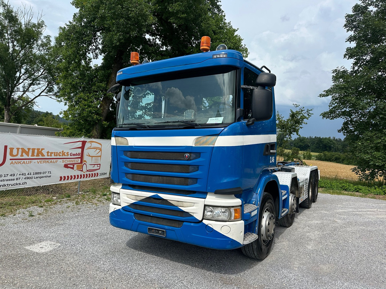 SCANIA G450 8x4 Abrollkipper - Kamion vetëngarkues: foto 1 SCANIA G450 8x4 Abrollkipper - Kamion vetëngarkues: foto 1